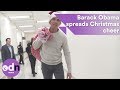 Barack Obama spreads Christmas cheer at Washington children's hospital