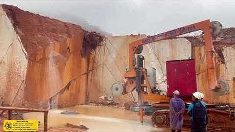 Vận hành máy cắt đá bằng dây kim cương cắt xẻ và khai thác đá núi - Cokhinhando.com