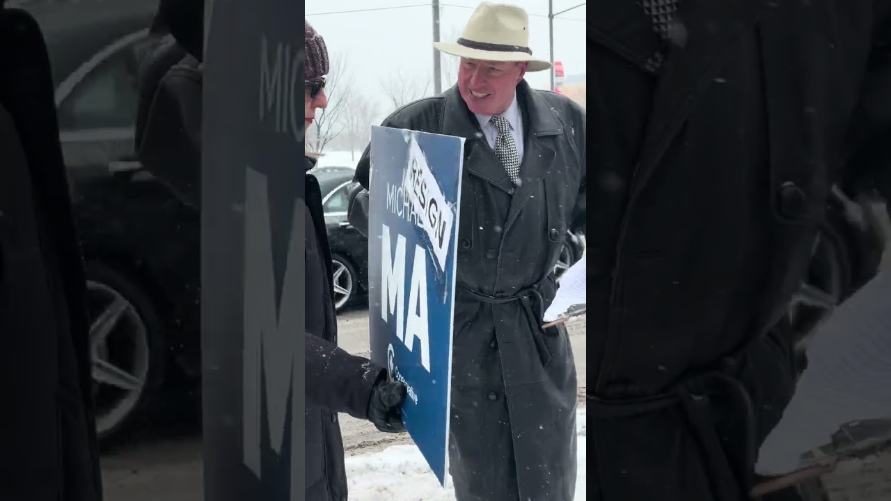 Filming the protest at the constituency office of Markham Unionville MP Michael Ma 