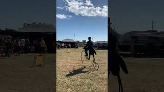 Dapper Gentleman on a Pennyfarthing @ Maitland Steamfest 2024