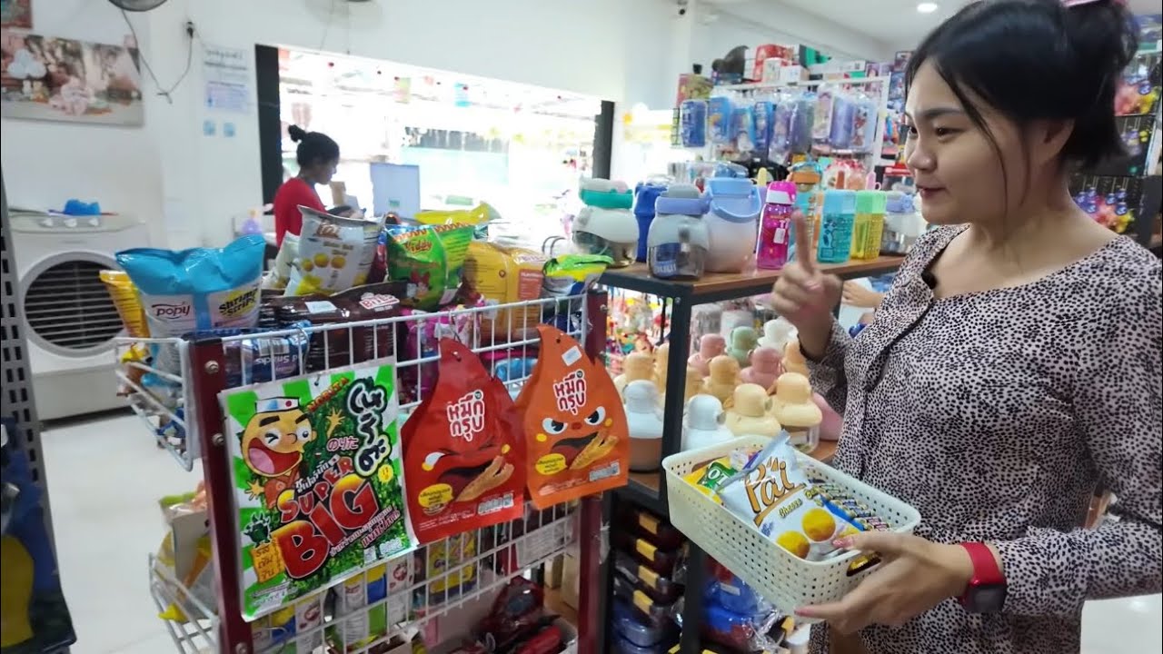 “What snacks can I buy at IQ shop with 5000 kyat?”