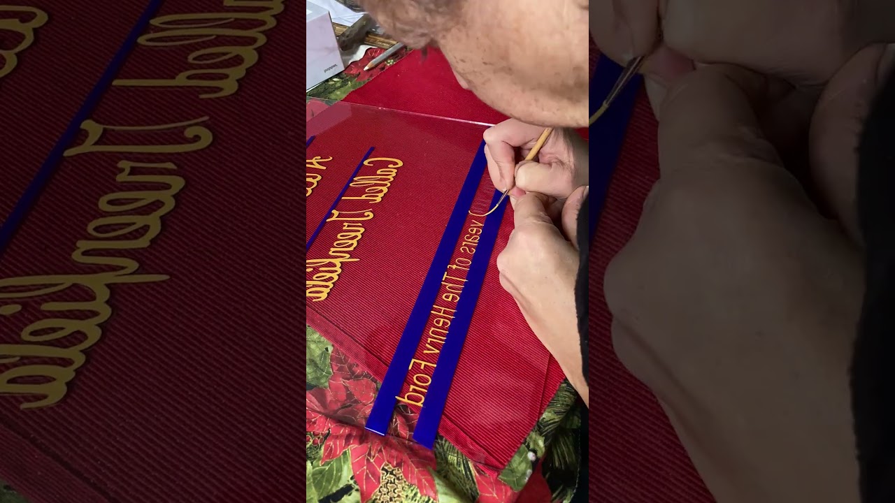 Lettering on glass a LEGO  display sign  