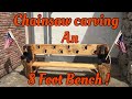Chainsaw carved bench . Chainsaw carved bench .