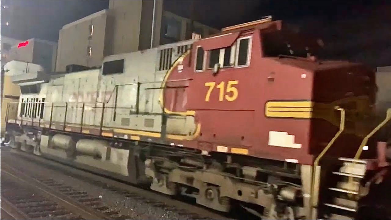 Red-and-silver BNSF-lettered warbonnet, NCTD Coaster, Amtrak Pacific Surfliner, San Diego Trolley