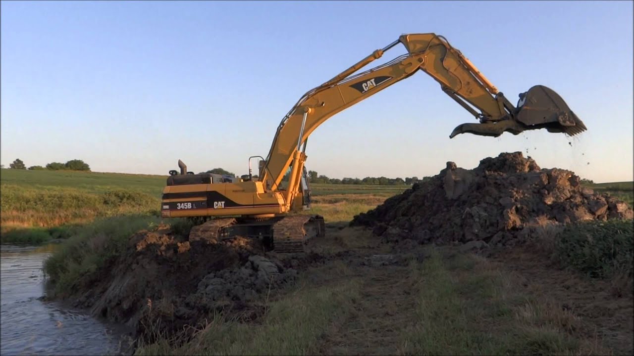 CAT 345B L II Cleaning Pond