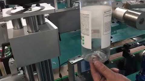1  fixed point round bottle labeling test video #threerollerslabelingmachine high accuracy labeling