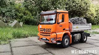RC MB Arocs (Kabolite 3362) and RC Volvo EC160E loading wet gravel on a construction site / 4K Video