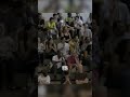 Andrew Wiggins drives past Joel Embiid and posterizes defender