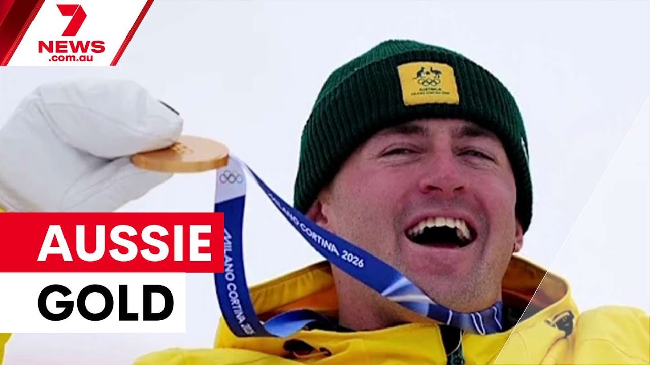 Cooper Woods claims Australia's first gold at 2026 Winter Olympics | 7NEWS