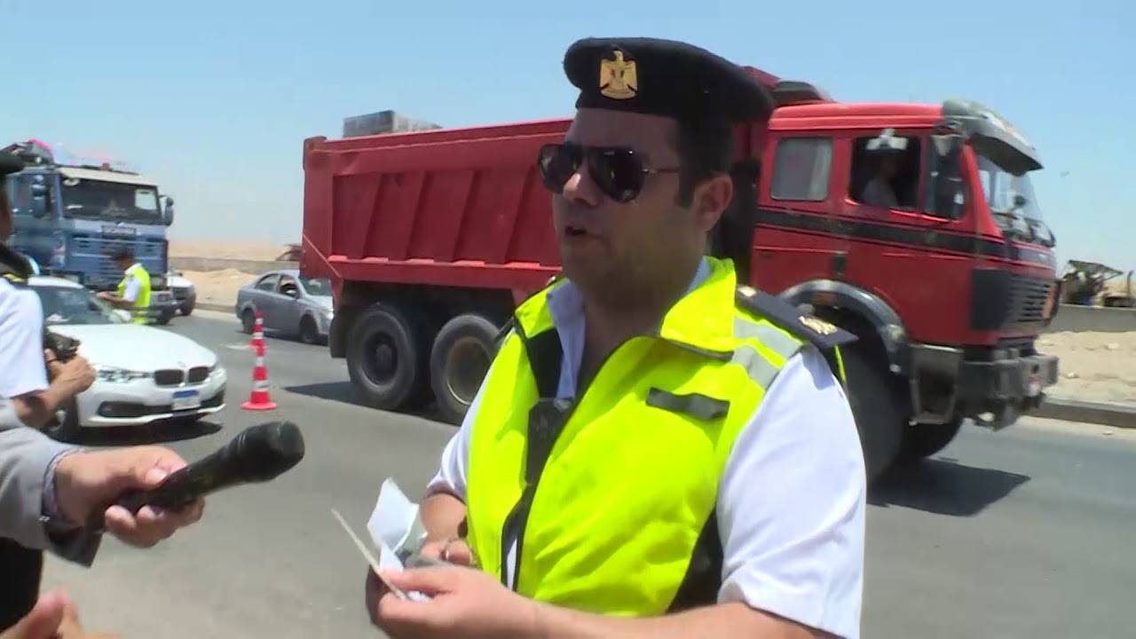 حملة مرورية شنتها الإدارة العامة للمرور على طريق القاهرة الفيوم الصحراوى