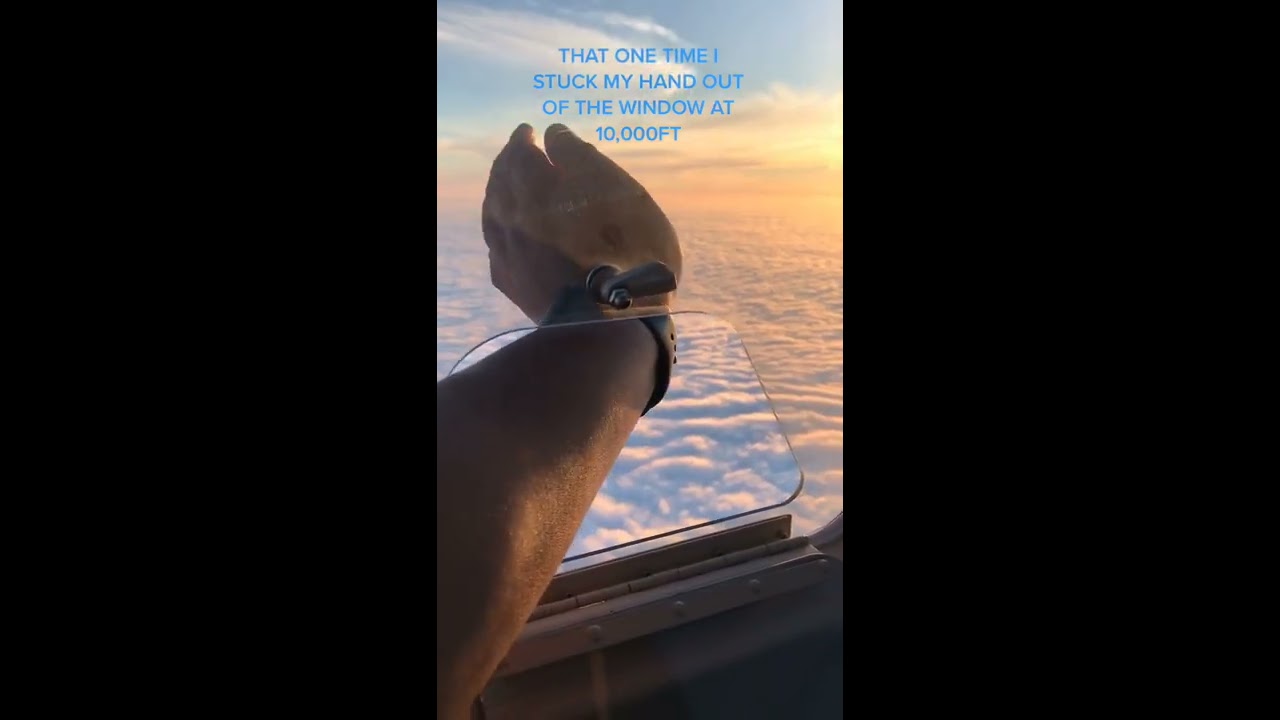 Pilot Open Window At 10000 Feet Up When Flying And Stuck Hand Fly Flight Shorts