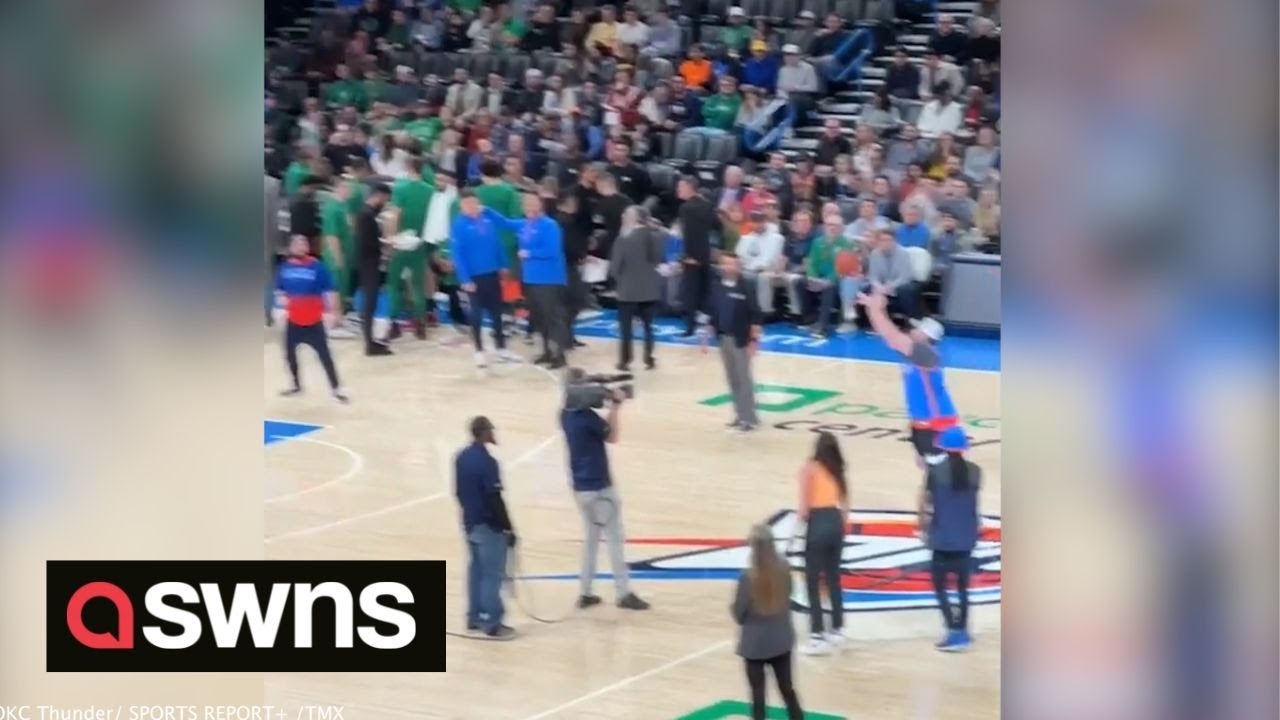 Warriors fan sinks half-court shot like it's no big deal, wins car — VIDEO