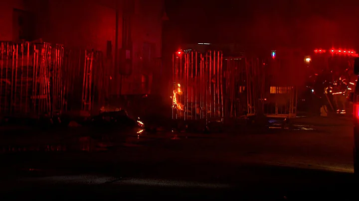 Frist on scene carts full of boxes catches fire behind a Dollar General