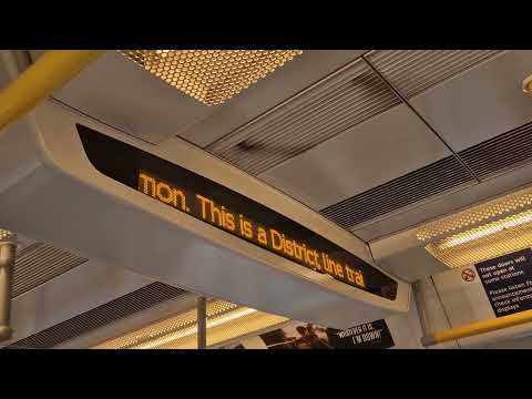 *NO ANNOUCMENT SOUND* District Line Announcement: The Next Station is Ealing Common.
