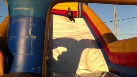 DANIEL McCUNE GOES DOWN SLIDE