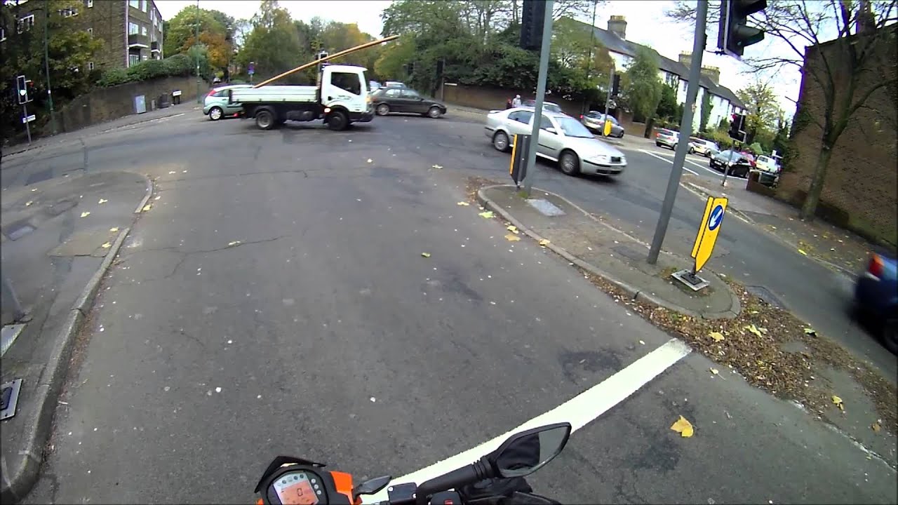 A car gets rear ended then another jumps the light after the crash ...