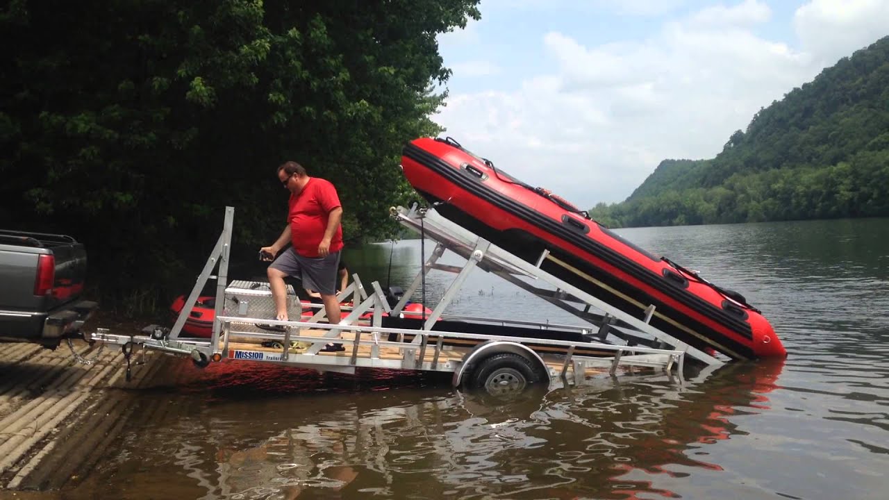 loading both inflatable boats - clinton twp. vol. fire co