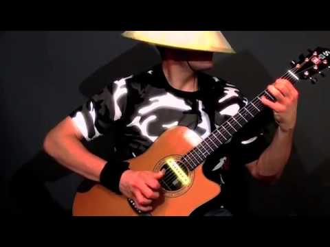 Удивительный стиль игры на гитаре от виртуозного канадского гитариста