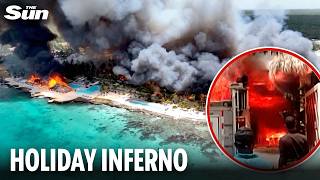 Tourist dies after fire rips through luxury beach resort as 1,700 holidaymakers forced to evacuate