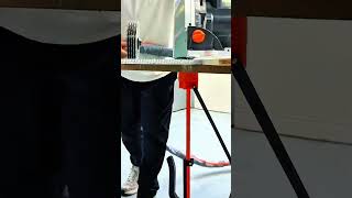 Saw glides along guide rail, crisp rhythm of morning precision cutting craft
