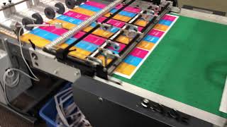 Insignia7 producing 6-up perf out tags from a 20x28" sheet