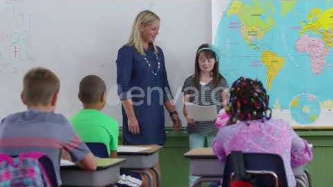 Student in front of class reading report | Stock Footage - Envato elements