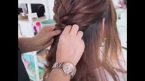Hướng dẫn tạo kiểu tóc cô dâu - Kiểu tóc cô dâu búi thấp nhẹ nhàng theo phong cách Hàn Quốc.