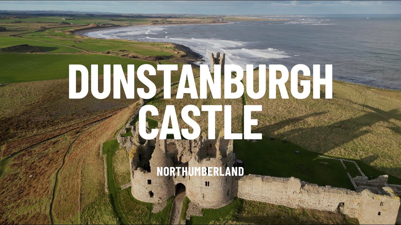 Dunstanburgh Castle by drone - a stunning walk from Craster or Embleton in Northumberland