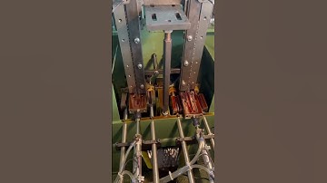 Two spindle nut tapping machine