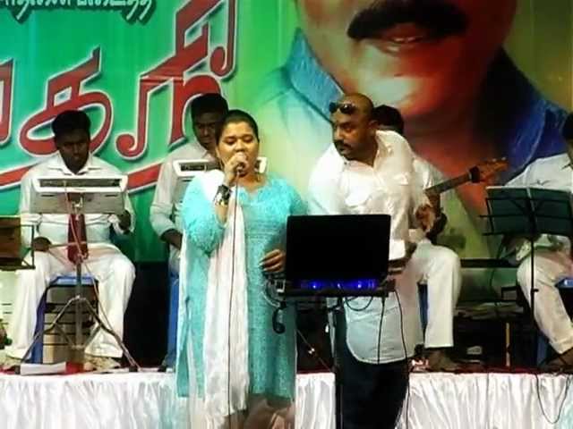 aayiram malargale malarungal singer