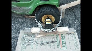 Removing rusted/siezed lawn tractor wheel with a BOTTLE JACK and WINNING!!