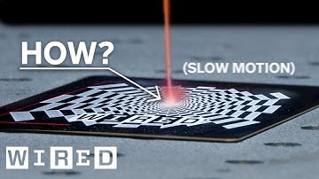 How Do Laser Beams Engrave Things? (slow motion) | WIRED