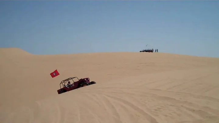 Allen Lorton Jumping his sand jeep