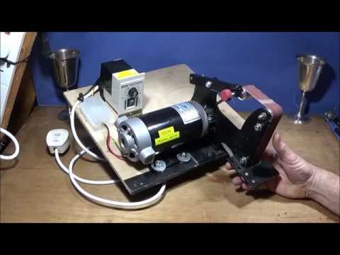 Angle Grinder Belt Sander Attachment Powered By A Treadmill Motor