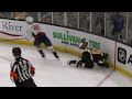 Hathaway throws a hit on Brad Marchand