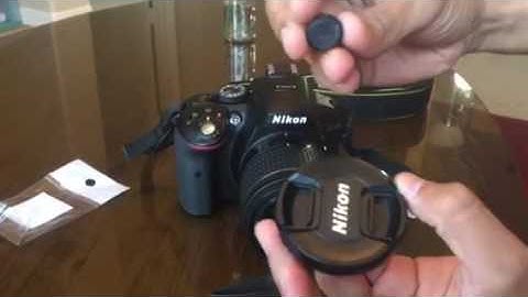 Universal camera lens cap keeper
