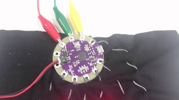 Sewn circuit: LilyPad Arduino, Pulse Sensor and LED lights