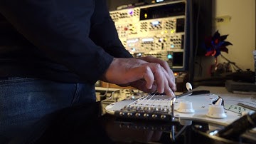 Guitar run through a EuroRack Synth - Robotic Sounds