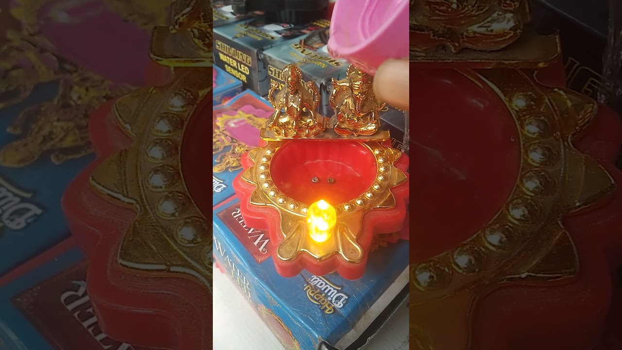 water sensor laxmi ganesh diya