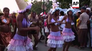 Revellers attend Carnaval des Fleurs parade