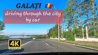 Driving through the city by car. Galati. Romania. 4K