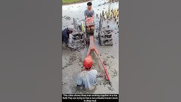 Farmers Free Tractor Trapped in Rice Field Mud