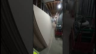 Construction Safety Fail: Stacked Drywall Collapse in Narrow Corridor (Training POV)