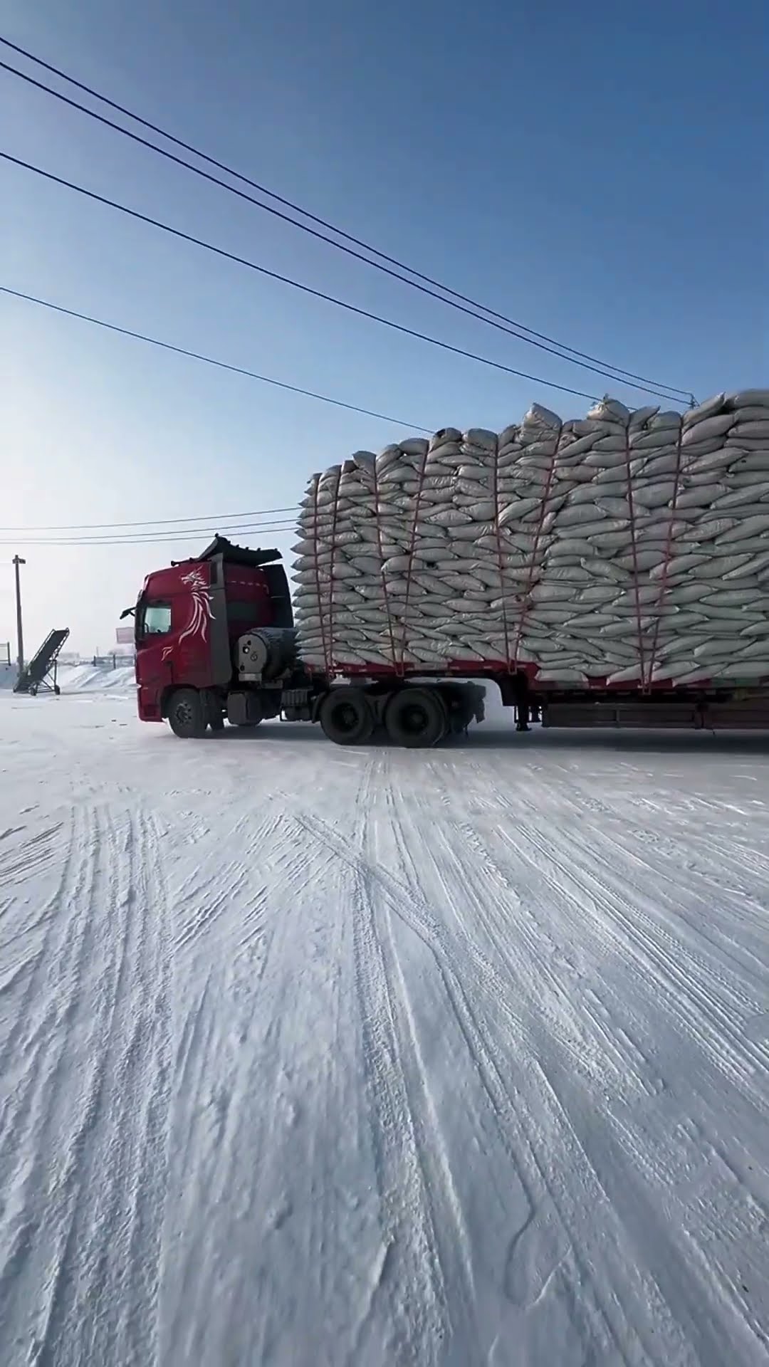 Heavy transport in snow and ice weather- Good tools and machinery make work easy