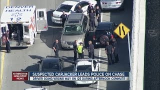 Carjacked minivan drives wrong way on I-25 during police chase