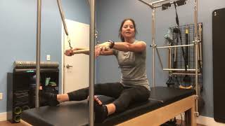 Neck Pull with roll down bar on springboard/Cadillac