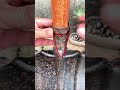 The Process of Attaching a Shovel Handle to an Iron Blade Using Locking Wire #shorts