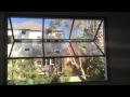 Horizontal bi-fold Window with brick pattern counterweight (by Vincenzo) Bondi NSW