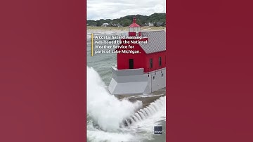 Waves slam Lake Michigan lighthouse #Shorts