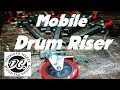 MOBILE DRUM RISER